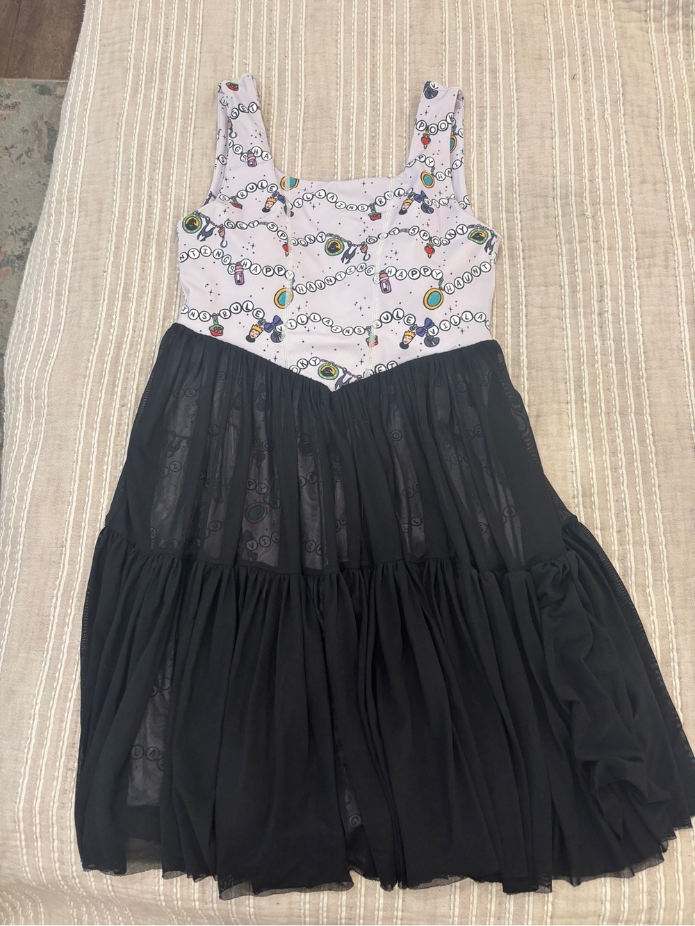 Casual Black Skirted Tank Dress with Printed White Bodice